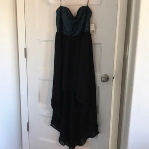 Sequence, peacock colored dress